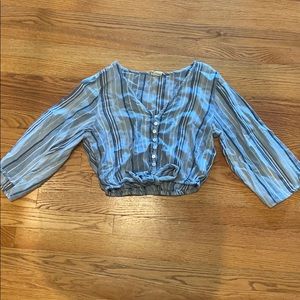 Blue cropped shirt